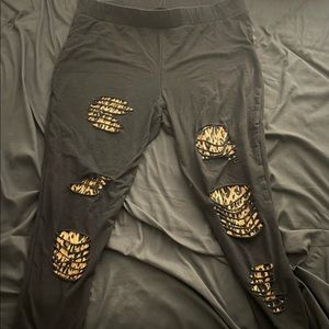 Torrid Cheetah print leggings with slits. Size 4